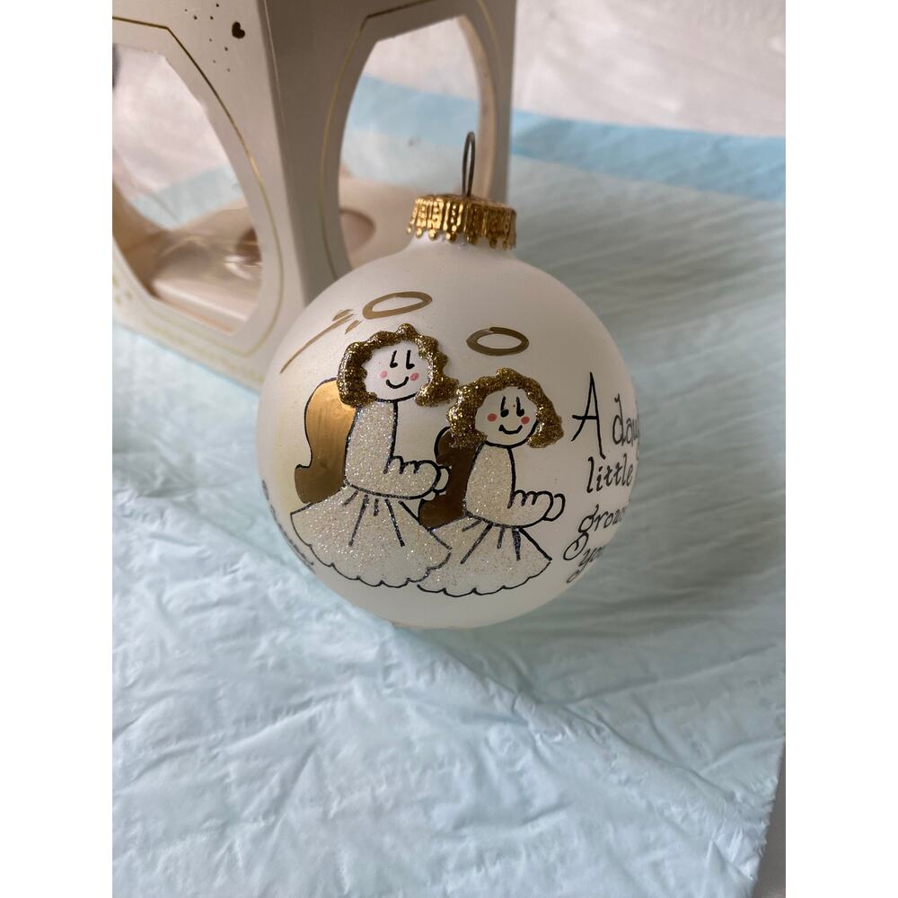 hand-painted Christmas ornament from the "Heart Gifts" by artist Teresa Thibault